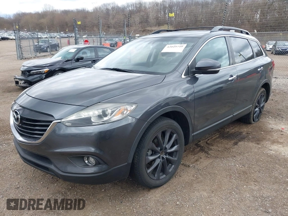 2015 Mazda CX-9 Grand Touring with VIN JM3TB3DV1F0465966, listed as a IAAI auction lot 42049749 with 74,470 mi miles and . Bid and sale history available at DreamBid. Image 2.