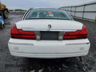 2003 Mercury Grand Marquis LS Premium with VIN 2MEFM75W13X667779, listed as a Copart auction lot 52869985 with 127,506 mi miles and Salvage Title. Bid and sale history available at DreamBid. Image 6.