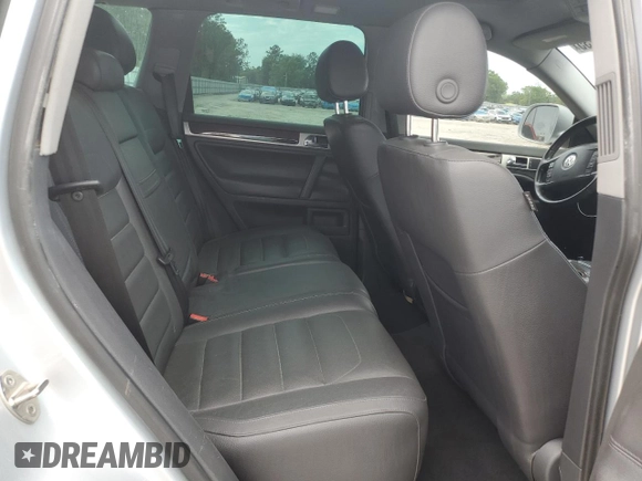 2008 Volkswagen Touareg V6 z VIN WVGBE77L98D003580, wystawiony jako Copart lot #52444235 z przebiegiem 150 876 mil mil oraz Szkoda całkowita • Salvage title. Historia ofert i sprzedaży dostępna na DreamBid. Obrazek 10.