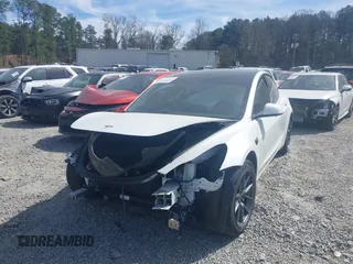2022 Tesla Model 3 Long Range with VIN 5YJ3E1EB0NF106570, listed as a IAAI auction lot 41832622 with 52,679 mi miles and . Bid and sale history available at DreamBid. Image 19.