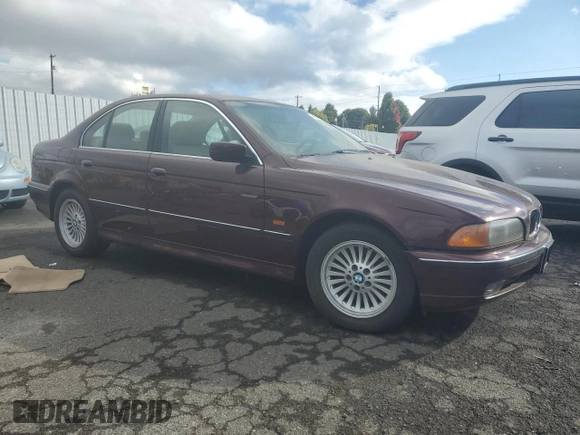 1997 BMW 5 Series 540i z VIN WBADE6320VBW54072, wystawiony jako Copart lot #74403104 z przebiegiem 98 910 mil mil oraz Czysty tytuł • Clean title. Historia ofert i sprzedaży dostępna na DreamBid. Obrazek 4.