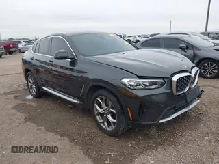 2022 BMW X4 xDrive30i with VIN 5UX33DT07N9M96858, listed as a IAAI auction lot 41242175 with 57,552 mi miles. Bid and sale history available at carsss.com. Image 1.