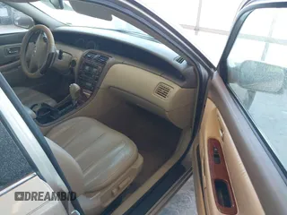 2002 Toyota Avalon XL with VIN 4T1BF28B32U255693, listed as a IAAI auction lot 41629186 with 221,335 mi miles and . Bid and sale history available at DreamBid. Image 5.