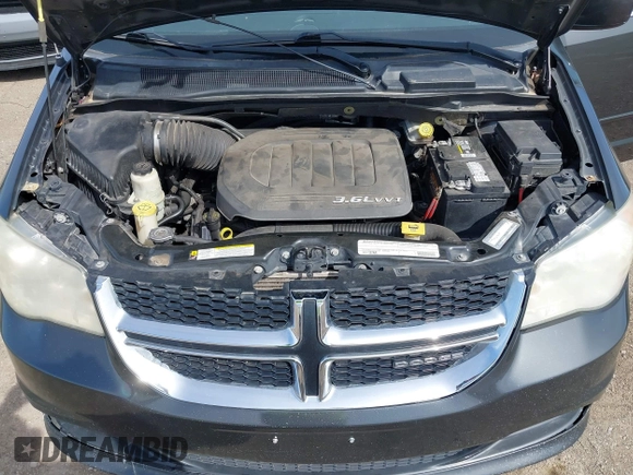 2011 Dodge Grand Caravan Crew with VIN 2D4RN5DG3BR660235, listed as a IAAI auction lot 41945522 with 148,924 mi miles and . Bid and sale history available at DreamBid. Image 10.