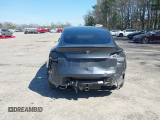 2021 Tesla Model Y Long Range with VIN 5YJYGDEE4MF119249, listed as a IAAI auction lot 41764711 with 87,796 mi miles. Bid and sale history available at carsss.com. Image 17.