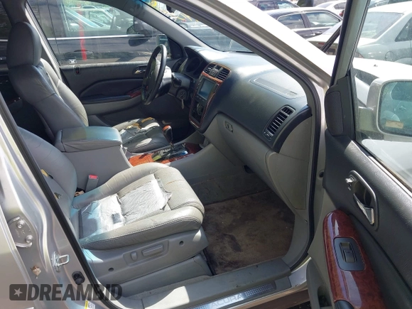 2004 Acura MDX Touring Pkg with VIN 2HNYD18664H517854, listed as a IAAI auction lot 41979134 with 144,713 mi miles. Bid and sale history available at carsss.com. Image 5.