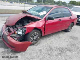 2006 Mitsubishi Lancer ES with VIN JA3AJ26E66U057223, listed as a IAAI auction lot 41665991 with 165359 miles. Bid and sale history available at carsss.com. Image 17.