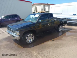 1996 Nissan Trucks 2WD XE with VIN 1N6SD16S5TC346136, listed as a IAAI auction lot 41676411 with 137,864 mi miles. Bid and sale history available at carsss.com. Image 17.