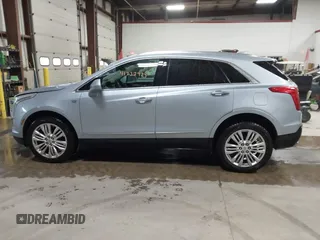 2017 Cadillac XT5 Premium Luxury AWD z VIN 1GYKNERS4HZ306955, wystawiony jako IAAI lot #41932934 z przebiegiem 150 050 mil mil oraz . Historia ofert i sprzedaży dostępna na DreamBid. Obrazek 14.