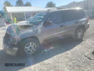 2006 GMC Envoy SLE with VIN 1GKDS13S662184697, listed as a Copart auction lot 80043434 with 196,077 mi miles and Salvage Title. Bid and sale history available at carsss.com. Image 1.
