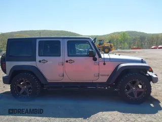 2015 Jeep Wrangler Unlimited Sport z VIN 1C4BJWDG6FL768265, wystawiony jako IAAI lot #42150124 z przebiegiem 85 108 mil mil oraz . Historia ofert i sprzedaży dostępna na DreamBid. Obrazek 13.