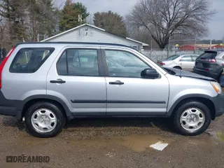 2005 Honda CR-V LX with VIN JHLRD78535C042479, listed as a IAAI auction lot 41682963 with 216,777 mi miles. Bid and sale history available at carsss.com. Image 14.