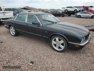 2002 Jaguar XJ with VIN SAJDA12C82LF42173, listed as a Copart auction lot 68505174 with 142,675 mi miles and Clean Title. Bid and sale history available at carsss.com. Image 4.