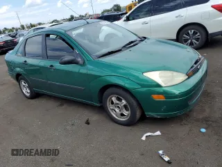 2002 Ford Focus LX with VIN 1FAFP33P32W117691, listed as a Copart auction lot 66618854 with Not Provided miles and Salvage Title. Bid and sale history available at DreamBid. Image 4.