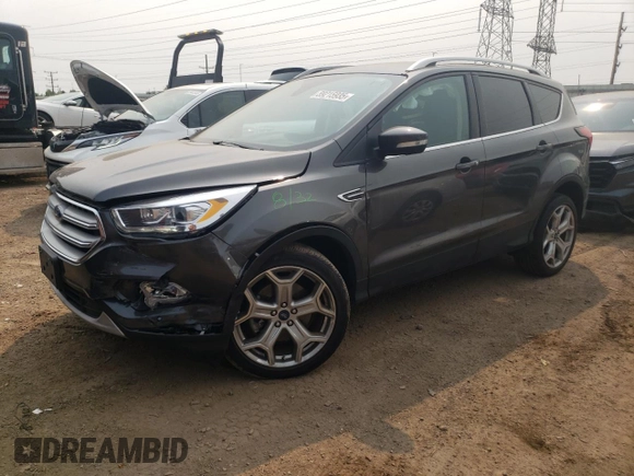 2019 Ford Escape Titanium with VIN 1FMCU9J98KUA56391, listed as a Copart auction lot 59215935 with 27,056 mi miles and Salvage title. Bid and sale history available at DreamBid. Image 1.