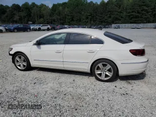 2014 Volkswagen CC R-Line with VIN WVWBP7AN4EE525757, listed as a Copart auction lot 55293795 with 124,890 mi miles and Salvage title. Bid and sale history available at DreamBid. Image 2.