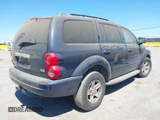 2005 Dodge Durango SLT z VIN 1D4HD48D35F532422, wystawiony jako IAAI lot #42331480 z przebiegiem 199 578 mil mil oraz . Historia ofert i sprzedaży dostępna na DreamBid. Obrazek 4.