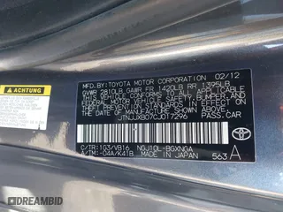 2012 Scion iQ with VIN JTNJJXB07CJ017296, listed as a IAAI auction lot 41636769 with 94,333 mi miles. Bid and sale history available at carsss.com. Image 9.