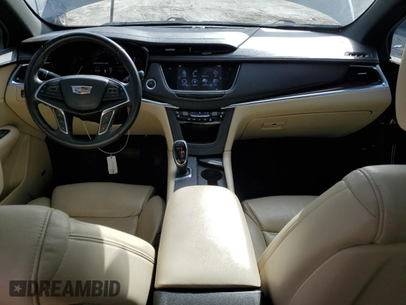 2017 Cadillac XT5 Premium Luxury FWD with VIN 1GYKNCRS5HZ198298, listed as a Copart auction lot 48212495 with 95,648 mi miles and Salvage Title. Bid and sale history available at DreamBid. Image 8.