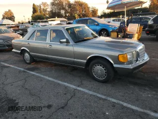 1988 Mercedes-Benz 560 with VIN WDBCA39D4JA391164, listed as a Copart auction lot 82628704 with 88,482 mi miles and Clean Title. Bid and sale history available at DreamBid. Image 4.