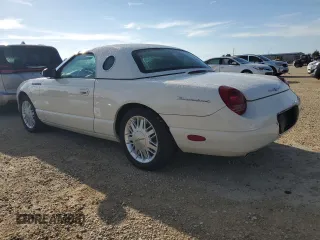 2002 Ford Thunderbird Hardtop Premium z VIN 1FAHP60A92Y103048, wystawiony jako Copart lot #73916924 z przebiegiem 75 396 mil mil oraz Szkoda całkowita • Salvage title. Historia ofert i sprzedaży dostępna na DreamBid. Obrazek 2.