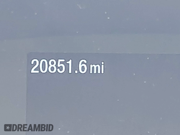 2024 Ford Transit Cargo z VIN 1FTBR1C84RKA39388, wystawiony jako IAAI lot #42069825 z przebiegiem 20 851 mil mil oraz . Historia ofert i sprzedaży dostępna na DreamBid. Obrazek 7.