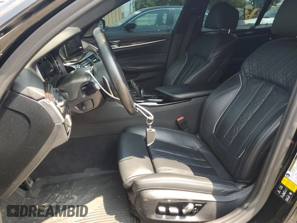 2019 BMW 5 Series 540i xDrive z VIN WBAJE7C55KWW20197, wystawiony jako Copart lot #58353645 z przebiegiem 50 431 mil mil oraz Szkoda całkowita • Salvage title. Historia ofert i sprzedaży dostępna na DreamBid. Obrazek 7.