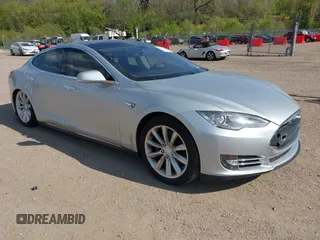 2012 Tesla Model S Performance with VIN 5YJSA1DP3CFP01348, listed as a IAAI auction lot 42185490 with 181,217 mi miles and . Bid and sale history available at DreamBid. Image 1.