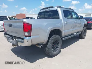 2018 Toyota Tacoma SR with VIN 3TMCZ5AN2JM172829, listed as a IAAI auction lot 42073847 with 136,671 mi miles and . Bid and sale history available at carsss.com. Image 4.