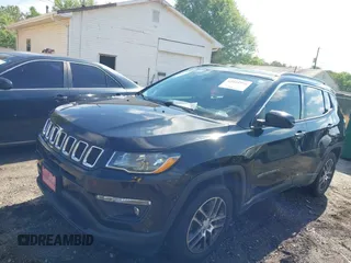 2020 Jeep Compass Latitude with VIN 3C4NJCBBXLT166004, listed as a IAAI auction lot 42025390 with 106,271 mi miles and . Bid and sale history available at carsss.com. Image 2.