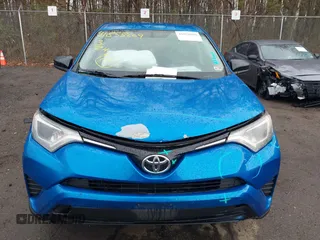2016 Toyota RAV4 LE with VIN JTMBFREV9GJ100635, listed as a IAAI auction lot 41858669 with 171,644 mi miles. Bid and sale history available at carsss.com. Image 12.