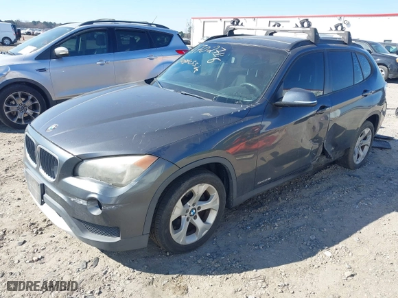 2014 BMW X1 sDrive28i with VIN WBAVM1C57EVW52502, listed as a IAAI auction lot 41702746 with 165,089 mi miles. Bid and sale history available at carsss.com. Image 17.