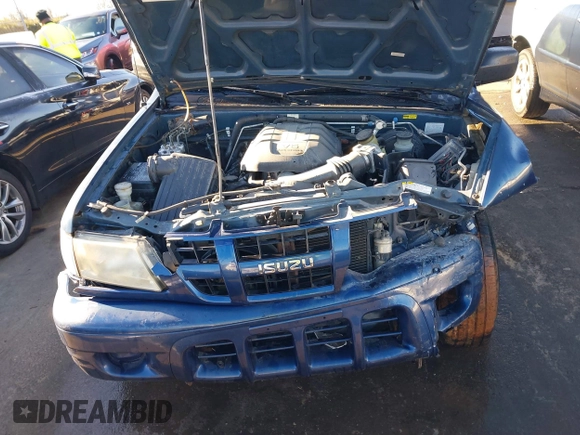2004 Isuzu Rodeo S with VIN 4S2CK58W444314265, listed as a IAAI auction lot 41294636 with 291,080 mi miles and . Bid and sale history available at DreamBid. Image 10.