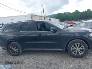 2016 Dodge Durango Limited with VIN 1C4RDHDG5GC340593, listed as a IAAI auction lot 42718563 with 191,071 mi miles and . Bid and sale history available at DreamBid. Image 13.