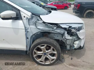 2019 Ford Escape Titanium with VIN 1FMCU9J90KUA86338, listed as a IAAI auction lot 42690159 with 115,891 mi miles and . Bid and sale history available at DreamBid. Image 18.