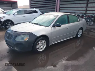 2006 Nissan Altima 2.5 S with VIN 1N4AL11EX6N303185, listed as a IAAI auction lot 41423674 with 240,388 mi miles. Bid and sale history available at carsss.com. Image 2.