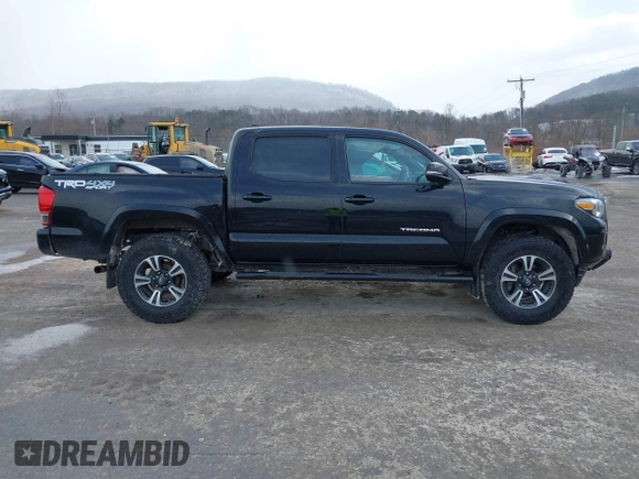 2016 Toyota Tacoma SR with VIN 3TMCZ5AN2GM027945, listed as a IAAI auction lot 41446277 with 51,781 mi miles and . Bid and sale history available at DreamBid. Image 14.