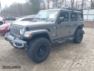 2019 Jeep Wrangler Unlimited Sahara with VIN 1C4HJXEGXKW633636, listed as a IAAI auction lot 41733557 with 78,082 mi miles. Bid and sale history available at carsss.com. Image 18.