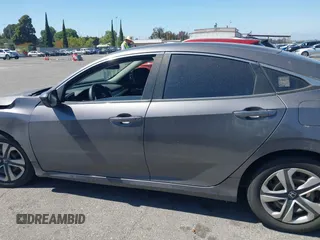 2017 Honda Civic LX with VIN 2HGFC2F56HH525914, listed as a IAAI auction lot 42190331 with 139,464 mi miles and . Bid and sale history available at DreamBid. Image 14.