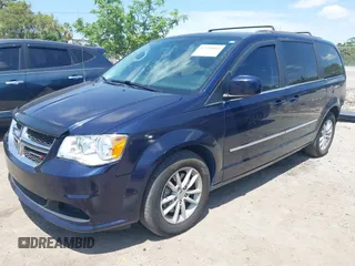2014 Dodge Grand Caravan SXT with VIN 2C4RDGCG3ER266199, listed as a IAAI auction lot 42119064 with 148,067 mi miles and . Bid and sale history available at DreamBid. Image 18.
