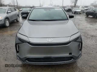 2023 Toyota bZ4X XLE with VIN JTMABACA8PA040484, listed as a Copart auction lot 51410705 with 9,807 mi miles and Salvage Title. Bid and sale history available at DreamBid. Image 5.