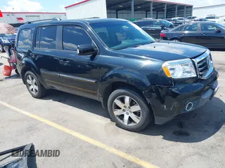 2013 Honda Pilot Touring z VIN 5FNYF3H98DB023104, wystawiony jako IAAI lot #42310538 z przebiegiem 169 385 mil mil oraz . Historia ofert i sprzedaży dostępna na DreamBid. Obrazek 1.