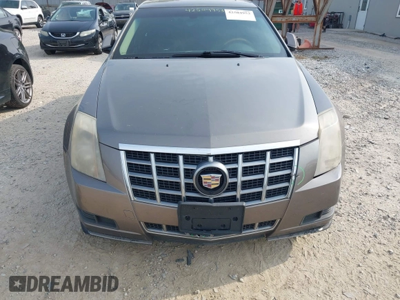 2012 Cadillac CTS Luxury with VIN 1G6DE5E5XC0137961, listed as a IAAI auction lot 42504953 with 179,263 mi miles and . Bid and sale history available at DreamBid. Image 6.