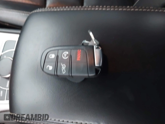 2021 Jeep Grand Cherokee 80th Anniversary with VIN 1C4RJFBG2MC614814, listed as a IAAI auction lot 41486793 with 88,089 mi miles and . Bid and sale history available at DreamBid. Image 11.
