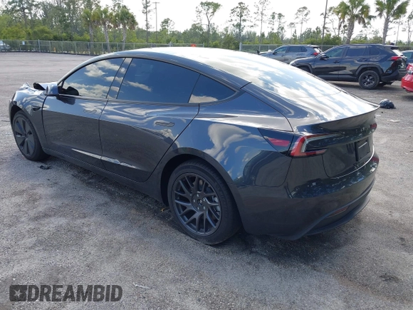 2025 Tesla Model 3 Long Range with VIN 5YJ3E1EA9SF897555, listed as a IAAI auction lot 41886716 with 6,757 mi miles and . Bid and sale history available at carsss.com. Image 3.