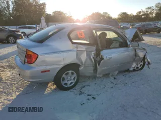 2005 Hyundai Accent GLS with VIN KMHCG35CX5U357839, listed as a Copart auction lot 81465454 with Not Provided miles and Salvage Title. Bid and sale history available at carsss.com. Image 3.