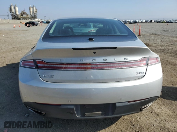2014 Lincoln MKZ Hybrid z VIN 3LN6L2LU7ER821918, wystawiony jako Copart lot #60754555 z przebiegiem 128 295 mil mil oraz Szkoda całkowita • Salvage title. Historia ofert i sprzedaży dostępna na DreamBid. Obrazek 6.