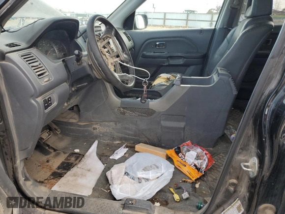 2004 Honda Pilot EX with VIN 5FNYF18514B001186, listed as a Copart auction lot 50233665 with 253,898 mi miles and Salvage Title. Bid and sale history available at DreamBid. Image 7.