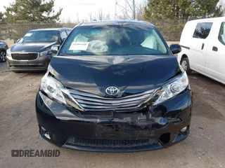 2015 Toyota Sienna XLE with VIN 5TDYK3DC2FS651400, listed as a IAAI auction lot 41985468 with 122,335 mi miles and . Bid and sale history available at DreamBid. Image 12.