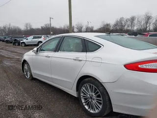 2015 Ford Fusion SE z VIN 3FA6P0HD1FR180083, wystawiony jako IAAI lot #41535579 z przebiegiem 109 363 mil mil oraz . Historia ofert i sprzedaży dostępna na DreamBid. Obrazek 14.